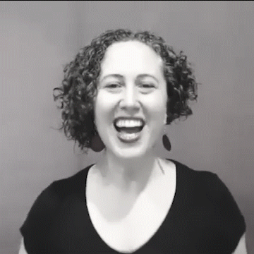 An animated black and white gif of Renee, chest up, mouthing "1-2-3 YOU ROCK" and clapping her hands.